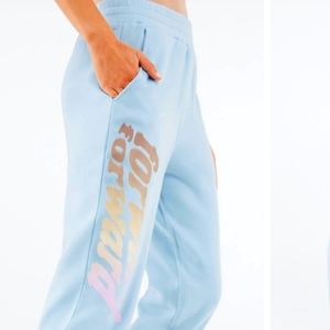 Reina graphic sweatpants size M color blue stone